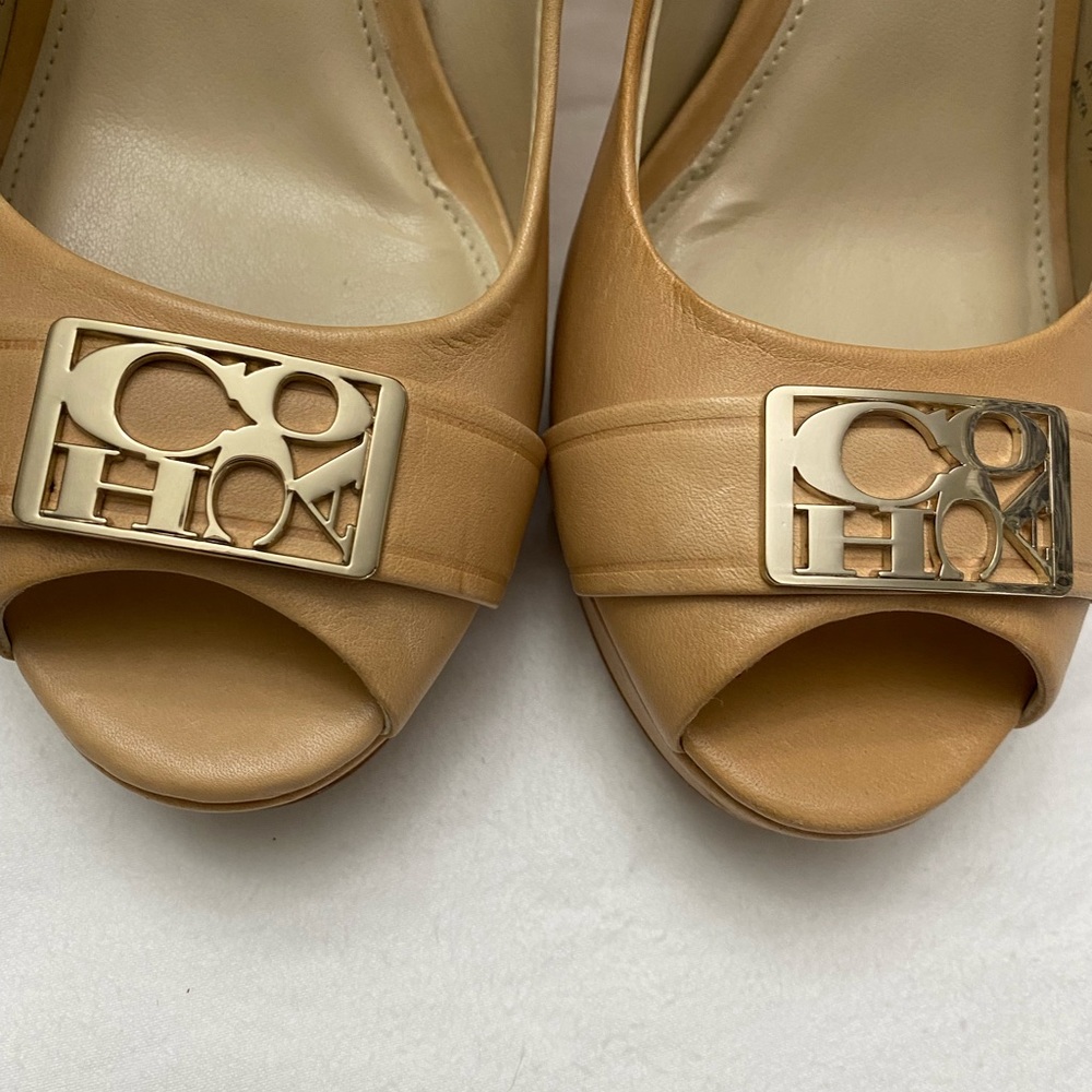 High heel beige coach shoes